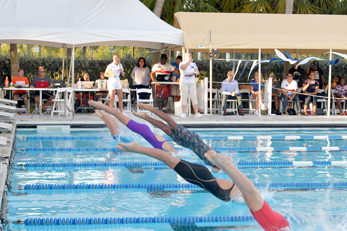 Cayman’s swimmers set new records